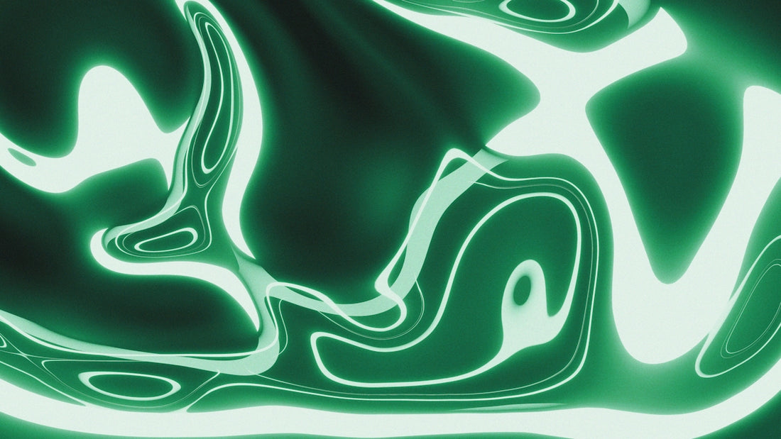 A green and white abstract background with swirls